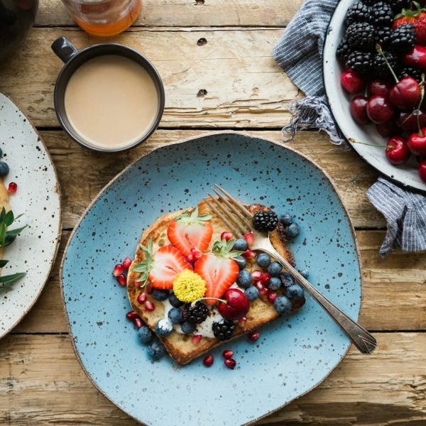 fruit sandwich on a blue ceramic plate